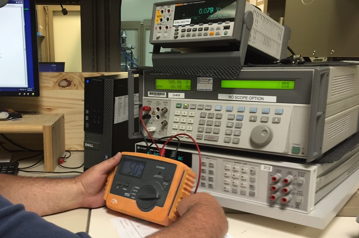 a man is checking out some electronic equipment