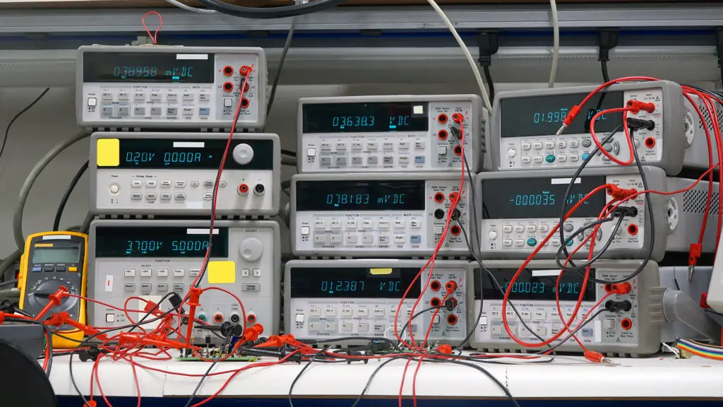 a large group of electronic devices on a table